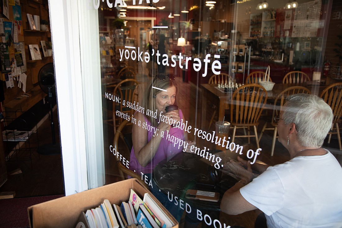 Ella Mae Kurashige, left, and Mary Lou Childs sip coffee and enjoy "girl chat" Monday, Aug. 14 at Eucatastrophe Coffee and Used Books at 515 Front St. in downtown Lynden. The pair come every Monday at 10 a.m.