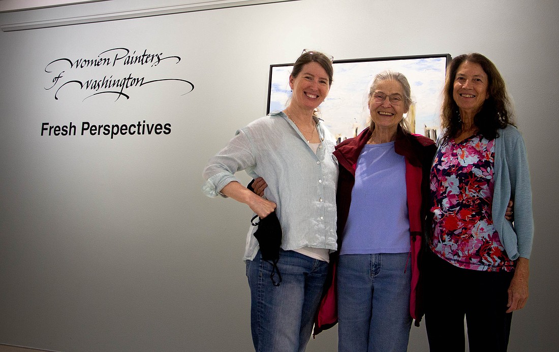 Colleen Hoffenbacker, left, Joy Olney and Mary Jo Maute on Aug. 22 at the "Fresh Perspectives" exhibit. In addition to the Bellingham-based artists who are members of the Women Painters of Washington, the exhibition features professional-level painters from throughout the state.