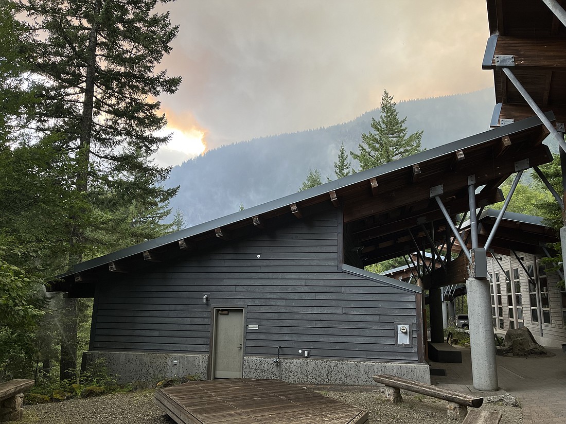 The North Cascades Institute's Environmental Learning Center campus pictured in August 2023 with the Sourdough Fire burning nearby. The center canceled all of its on-site programs for the rest of the year, according to a Friday, Aug. 25 announcement.