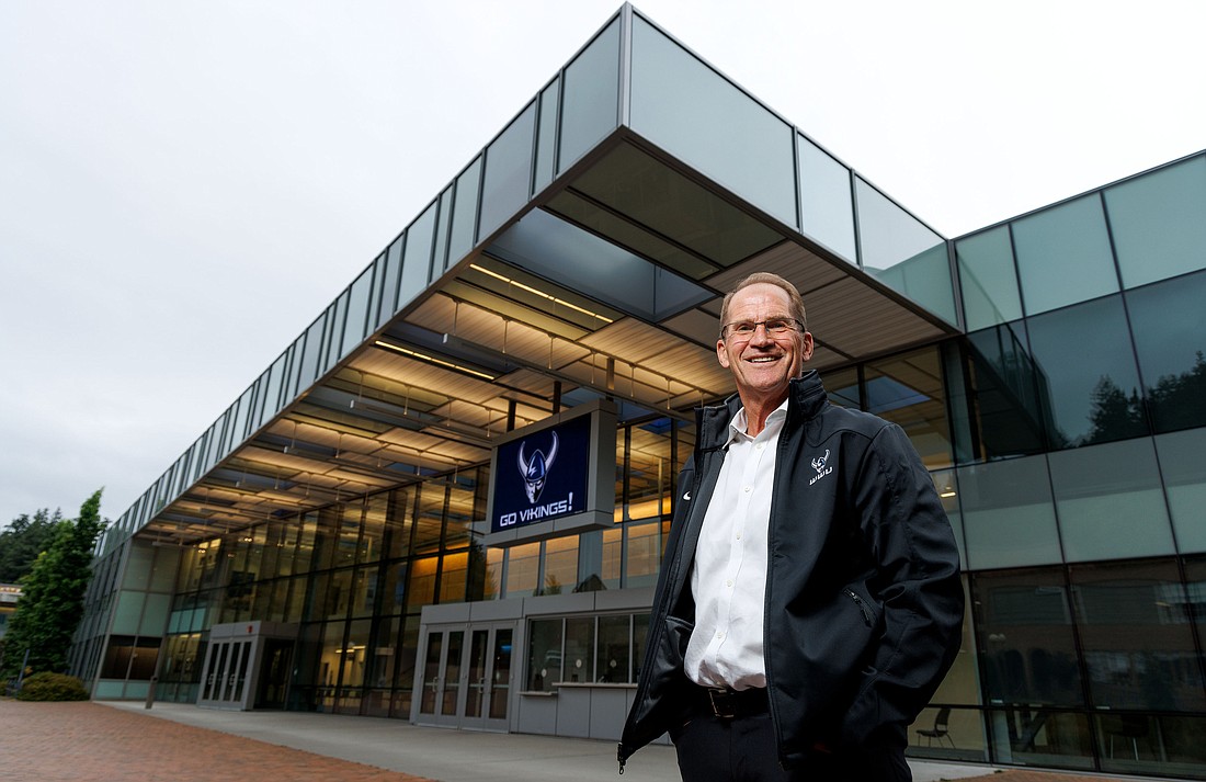 Jim Sterk, Western Washington University's director of athletics, stands in front of Carver Gymnasium Tuesday, Aug. 29 in Bellingham. Sterk, raised in Everson,  returns to his alma mater where he earned degrees in Business Administration and Physical Education.