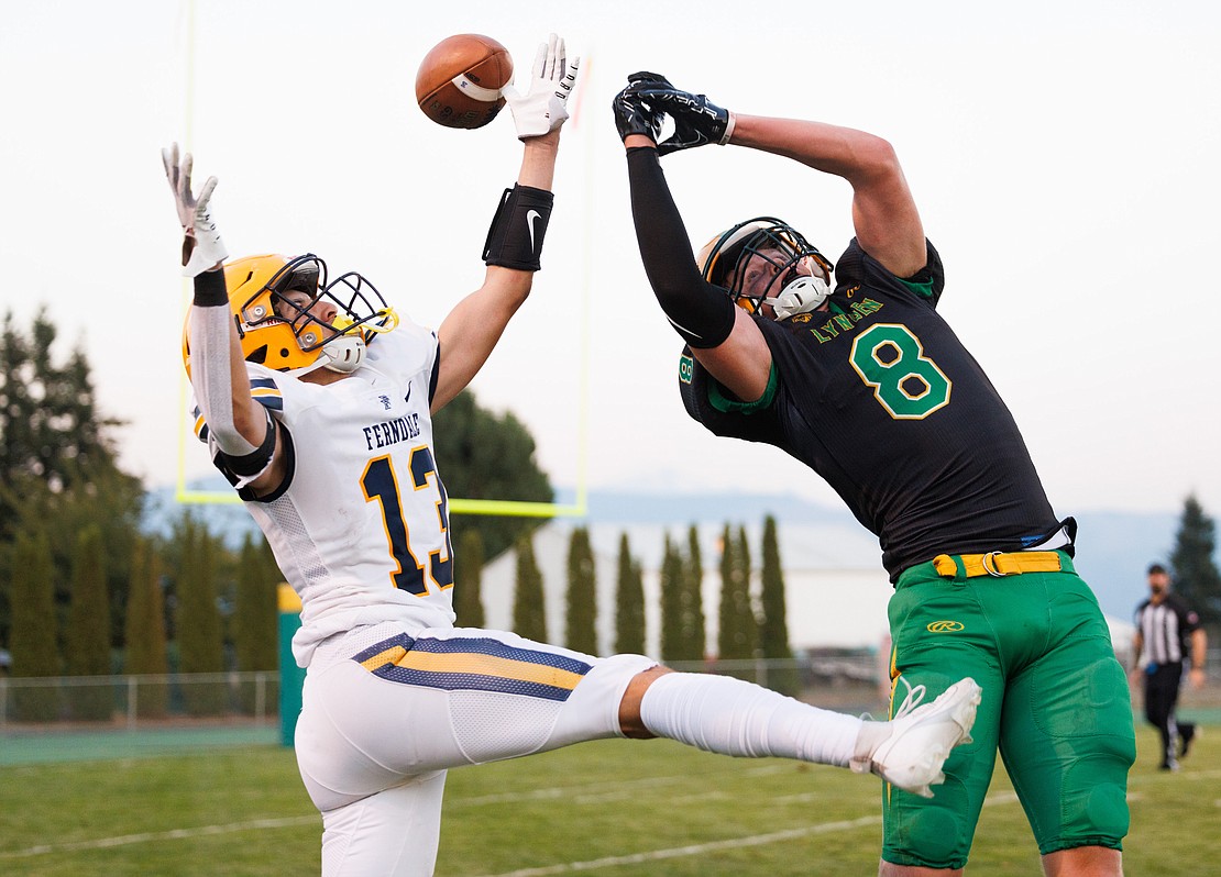 Ferndale’s Bishop Ootsey and Lynden’s Isaiah Oudman go up for a pass intended for Oudman.