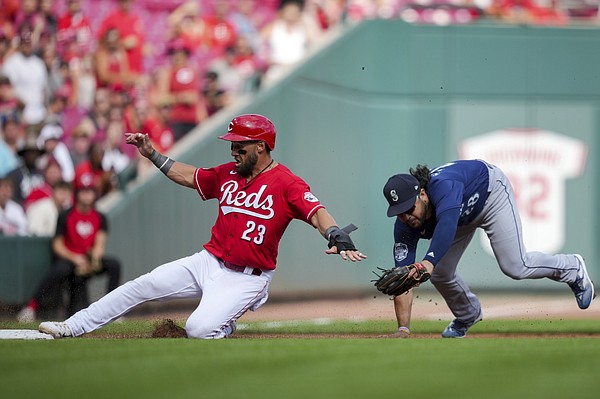 7 Eugenio Suarez of Venezuela and Short Stop for the Cincinnati Reds  Baseball team sits for …