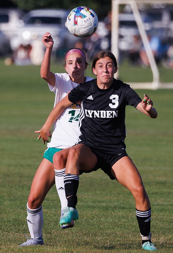 Sehome’s Ella Perry and Lynden’s Maliah Mitchell battle for the ball.