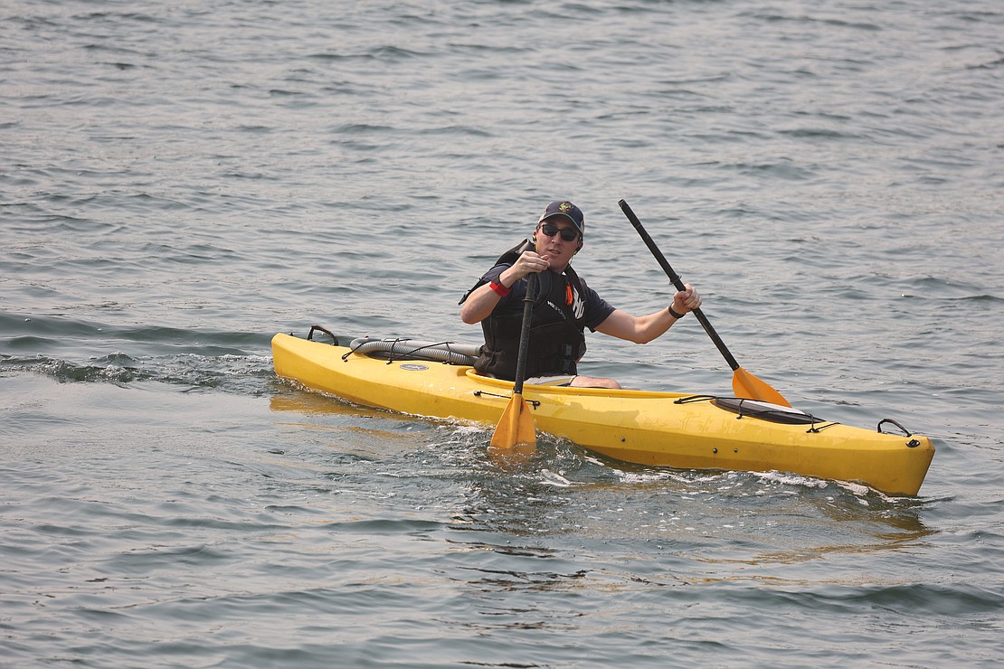 A paddler reacts as his paddle breaks in two Aug. 19 during the Bellingham Traverse.