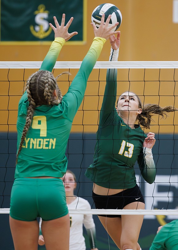 Sehome’s Maddie Behrends flicks the ball away from a Lions defender.