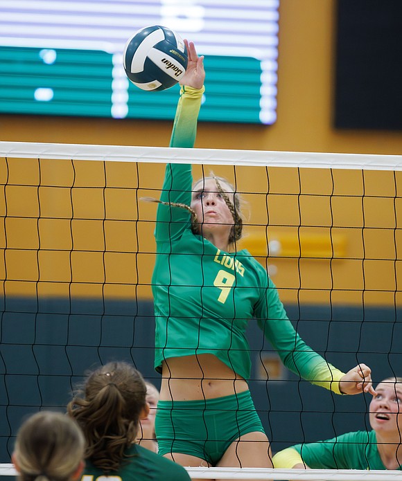 Lynden's Finley Parcher spikes the ball.
