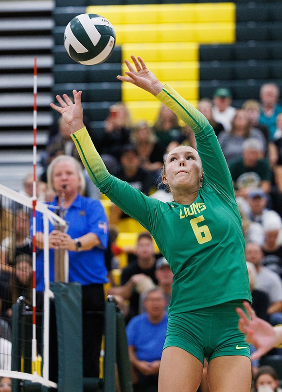 Lynden's Grace Rice sets the ball back over the net for a point.