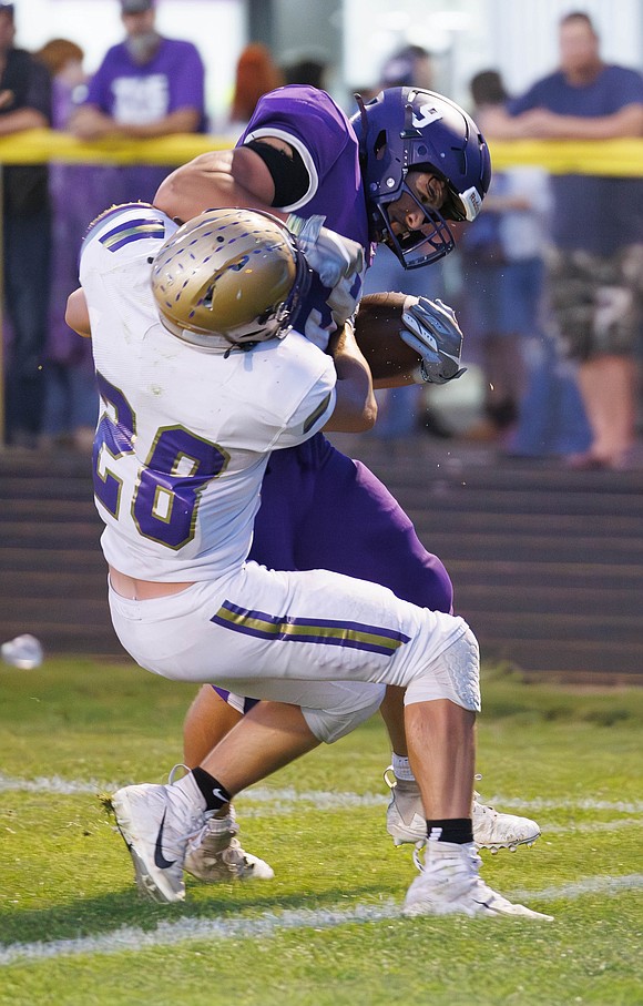 Nooksack Valley’s Colton Lentz battles his way into the end zone for a touchdown.