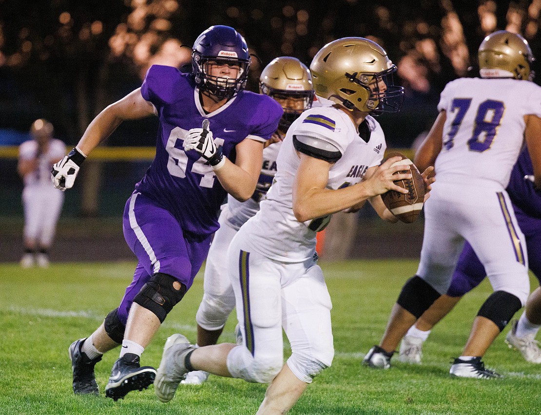 Nooksack Valley’s Brady Ackerman chases after Connell's quarterback.