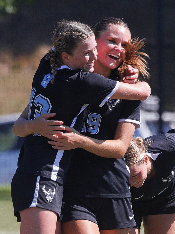 Western Washington University’s Mie Cairns, right, gets a hug from teammate Jane Hmura after Cairns scored the lone goal in Saturday’s win.
