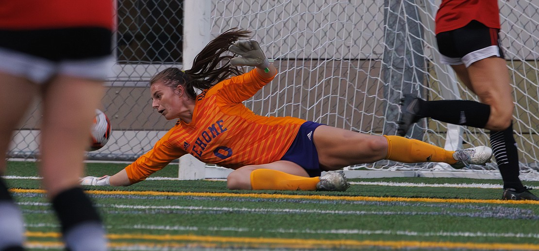 Sehome’s Clarice Hickey makes a diving save.