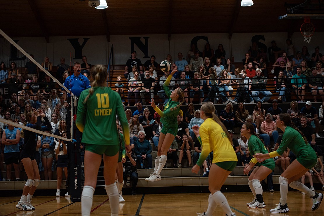 Lynden setter Grace Rice sends the ball over the net.