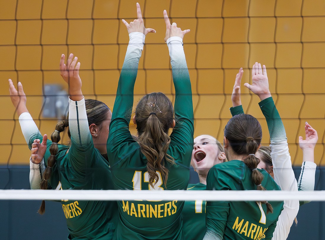Sehome players celebrate a lead in the first set on Wednesday, Sept. 6 against Lynden. Sehome lost to Lynden in three sets.