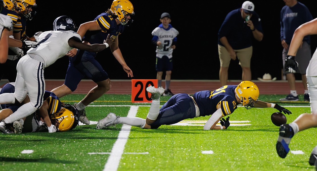 Ferndale’s Aydin O'Tool dives on a fumble to seal the win.