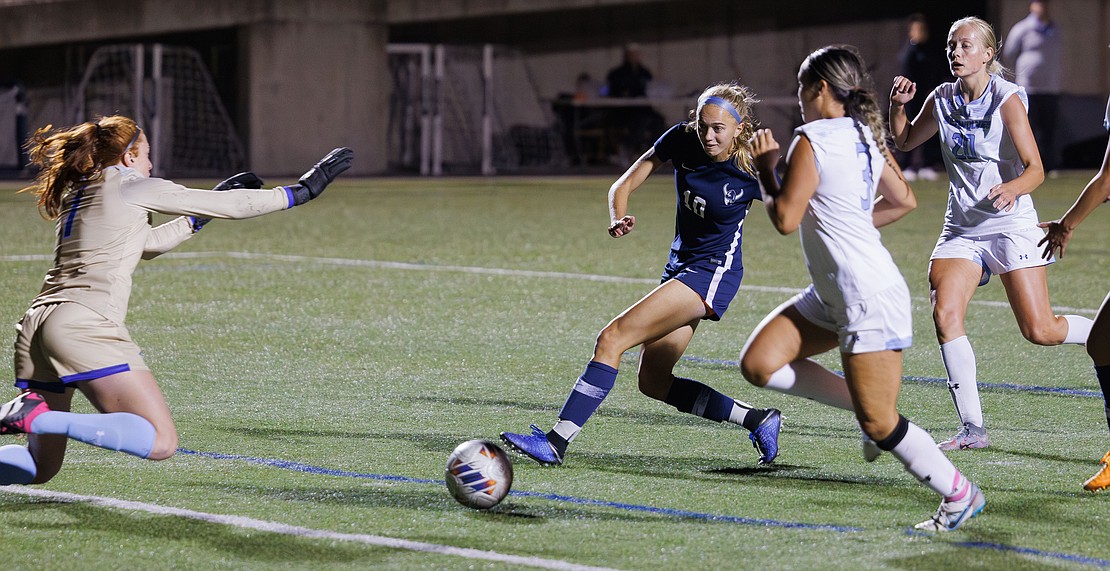 Western Washington University's Claire Potter takes one of her three shots on goal.