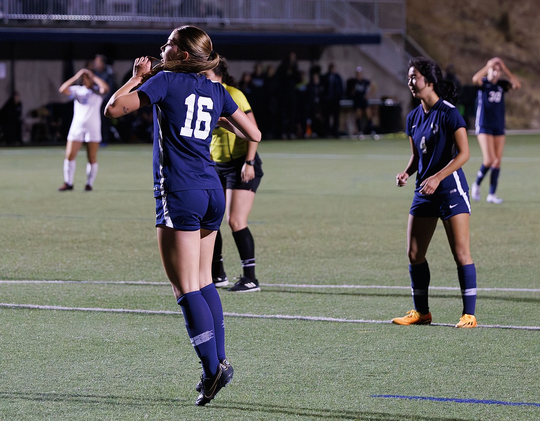 Western Washington University's Gracen Crosby (16) reacts to her missed shot on goal.