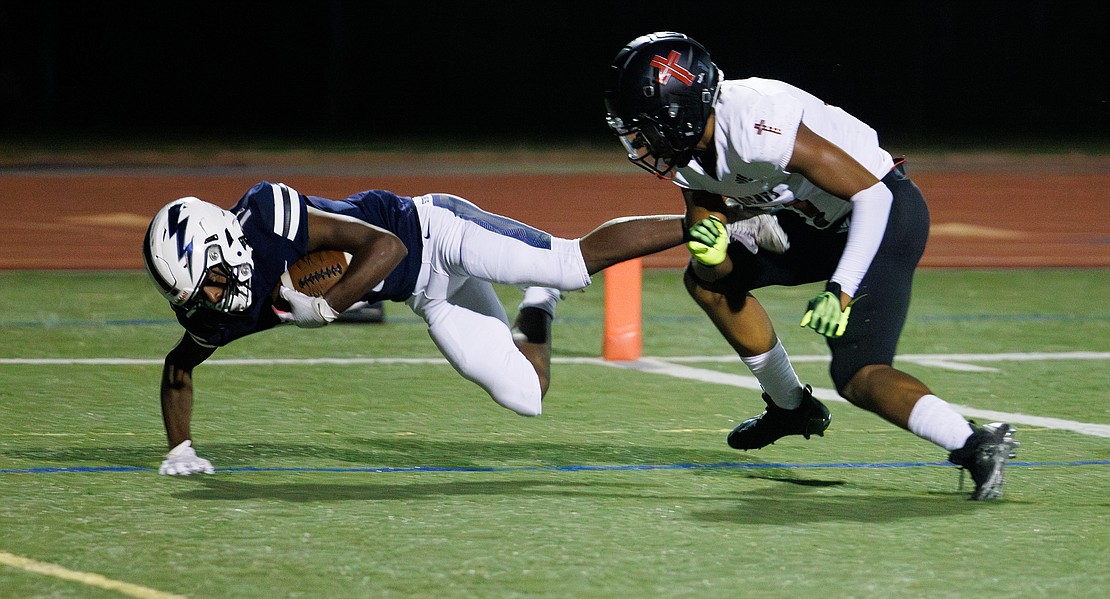 Squalicum's Joaquin Ortiz-Mcalister crashes in for the Storm’s only touchdown.