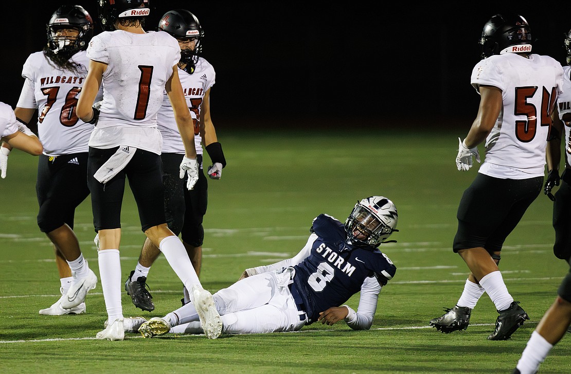 Squalicum's Marcus Nixon yells as he is tackled for a loss on fourth down.