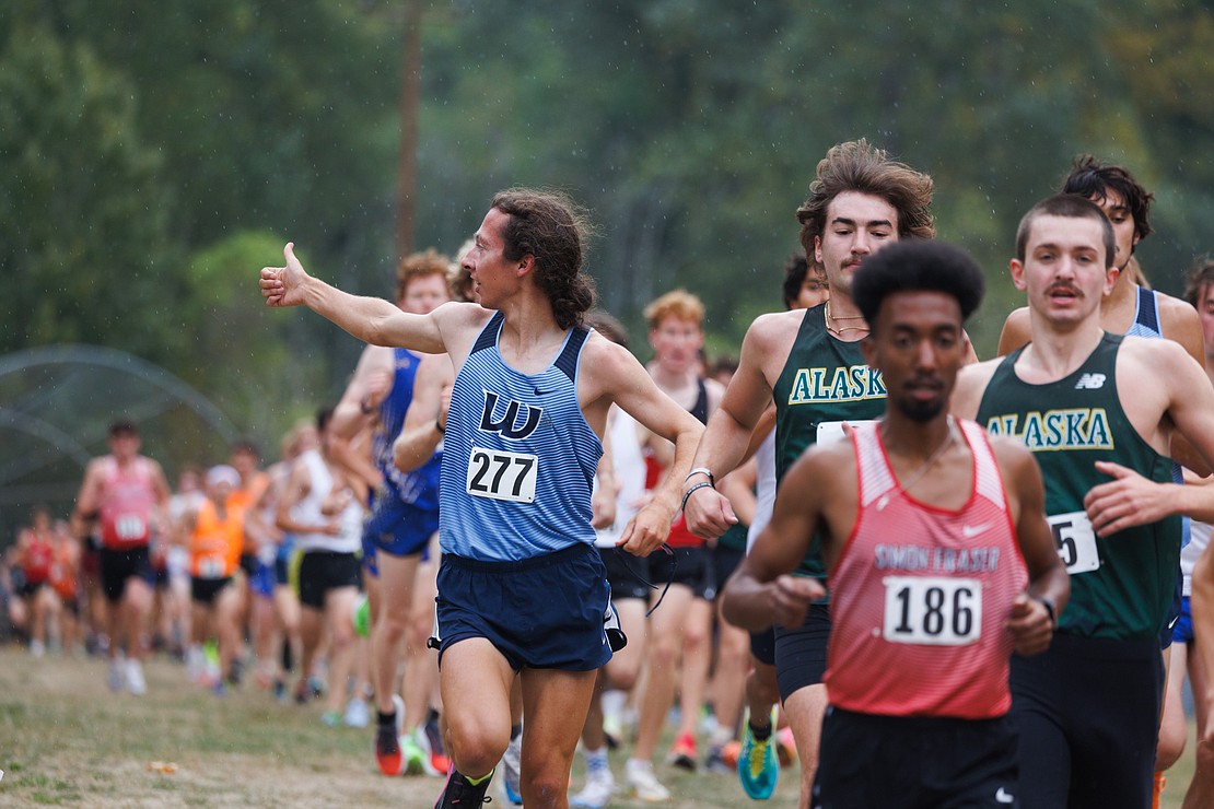 Western Washington University's Andrew Oslin gives a thumbs-up during the men’s race.
