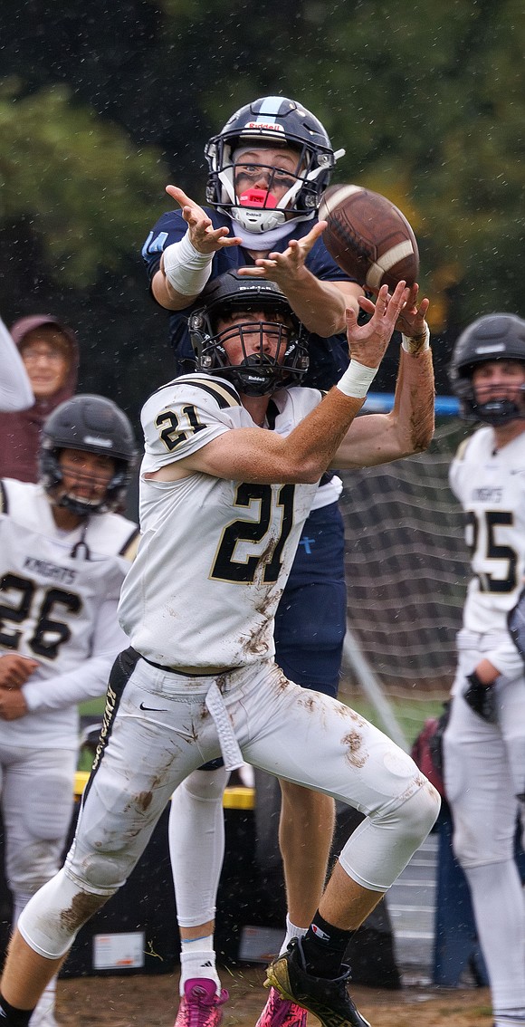 Lynden Christian's Tyson Bajema misses the pass and is nearly intercepted by a Royal player.
