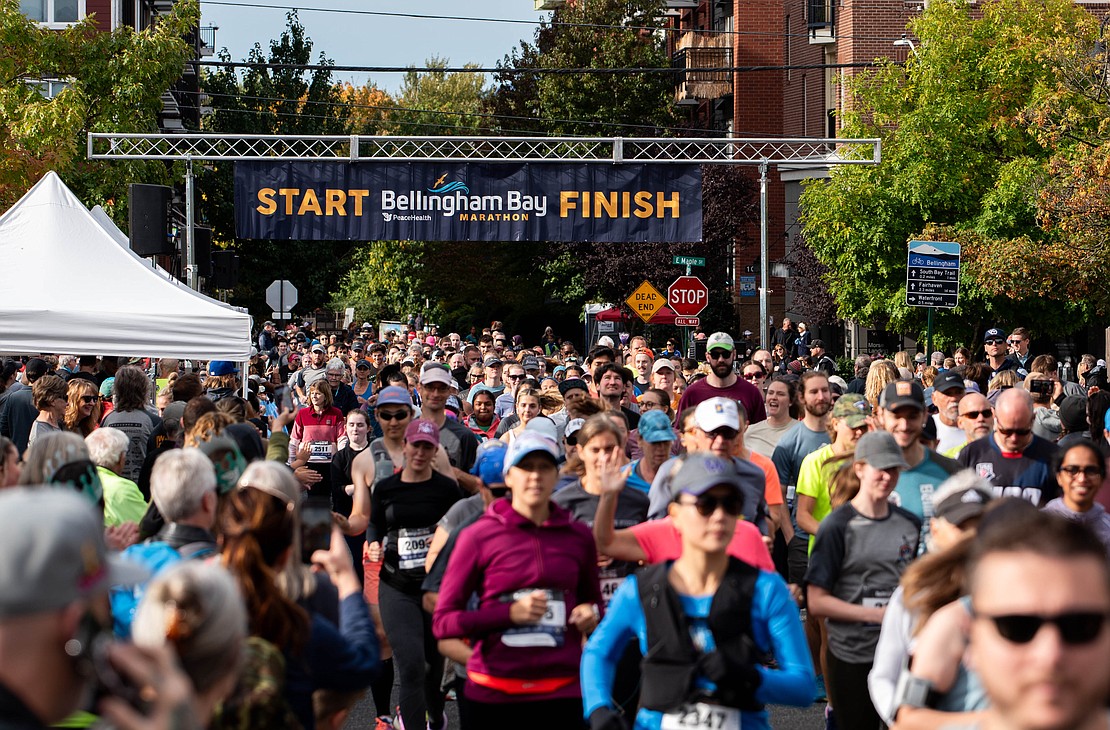 The half-marathon runners of the Bellingham Bay Marathon begin their race Sunday, Sept. 24 at the starting line on Railroad Avenue.