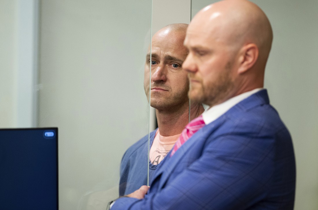 Joseph David Emerson, left, 44, was arraigned in Multnomah County Circuit Court on Tuesday, Oct. 24 in Portland, Ore. The former Alaska Airlines pilot who police say tried to cut the engines while riding in the cockpit jump seat during a Horizon Air flight made his first appearance in federal court in Portland on Thursday, Oct. 26.