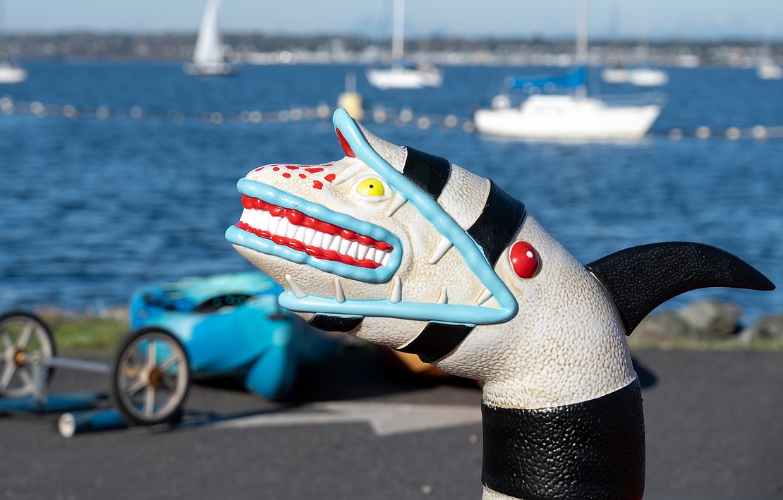 A sea serpent garden decoration adorns Shane Sobotka's kayak.