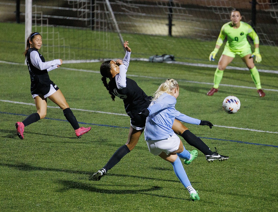 In the final minute, Western Washington University's Katie Watt takes a shot on the goal.