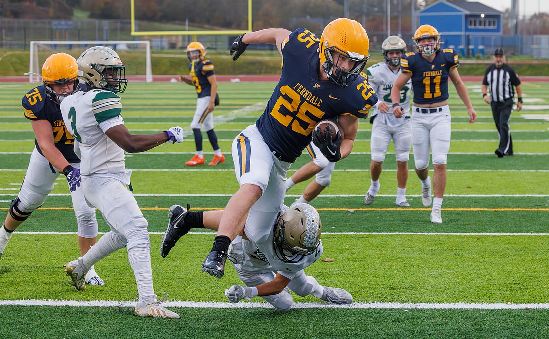 Ferndale’s Conner Walcker leaps in for the touchdown Saturday, Nov. 4 as the Golden Eagles beat Timberline 42-14 in a winner-to-state, loser-out 3A week 10 playoff game at home.
