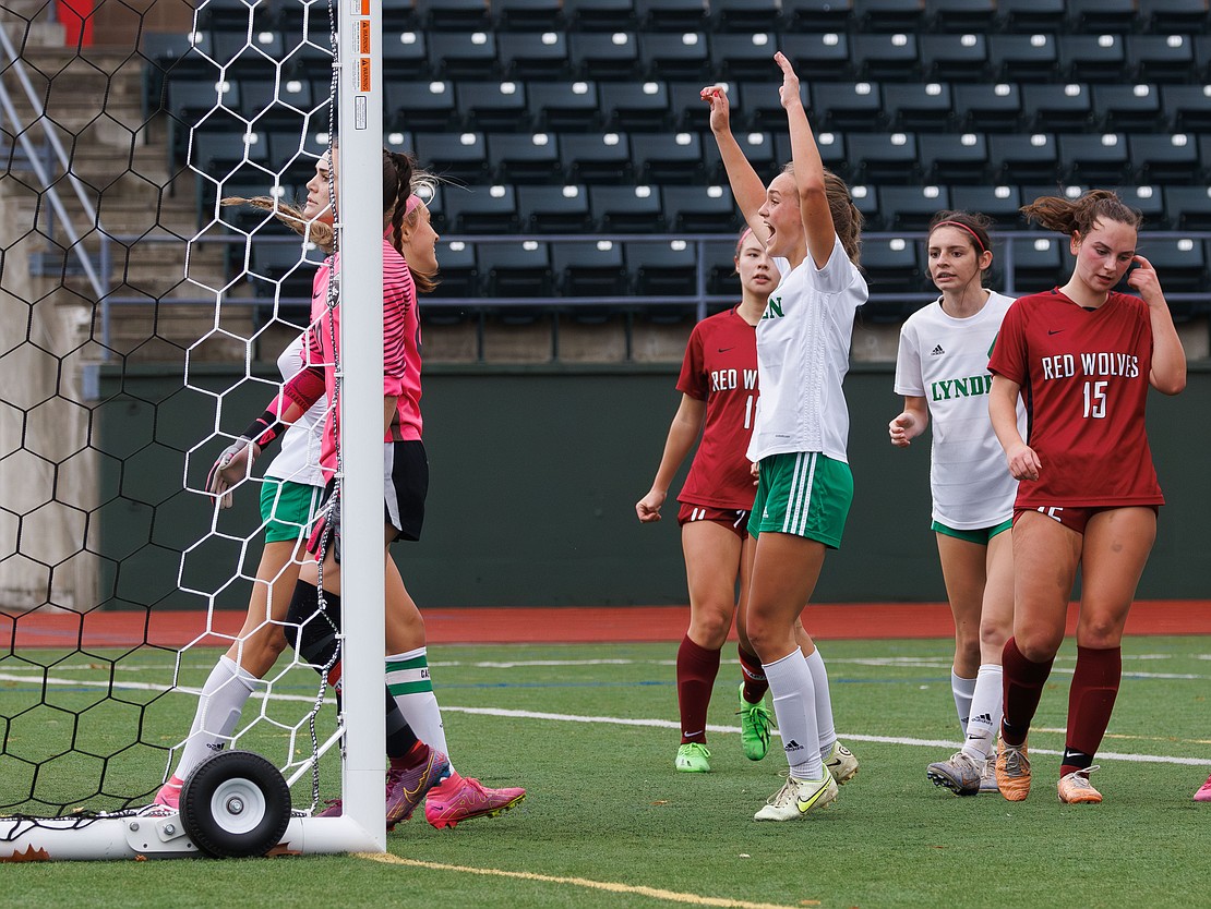 Lynden’s Jayda Villars celebrates a goal by teammate Mallary Villars, left.
