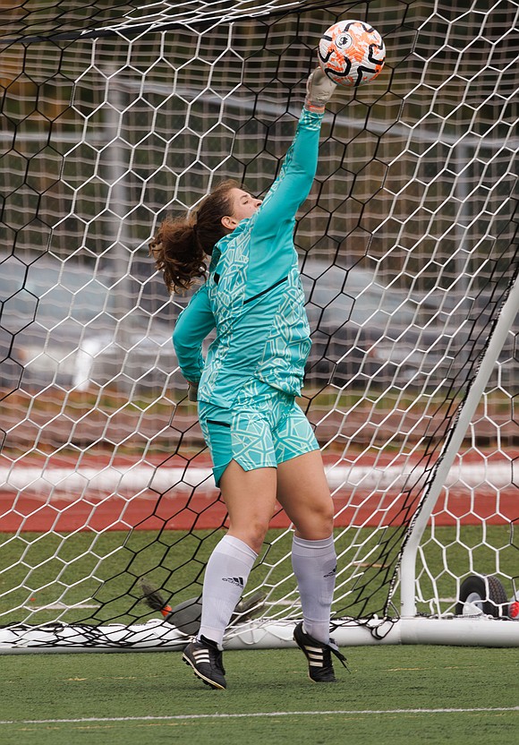 Lynden’s Isla Holman makes a save in the first half.