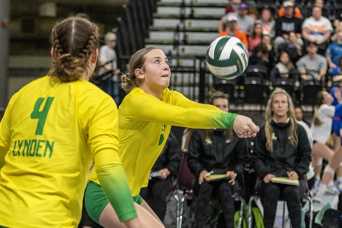 Lynden's Finley Parcher gets under a Tumwater serve.
