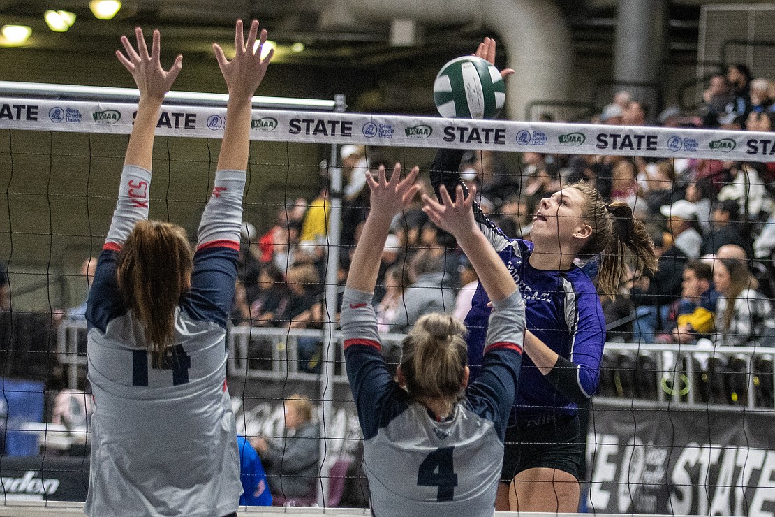 Nooksack Valley sophomore Grace DeHoog spikes against King's Way Christian's block Friday, Nov. 10, during the opening round of the 1A state tournament at the Yakima Valley SunDome. The Pioneers won in a sweep.