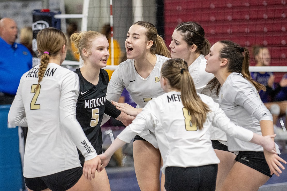 Meridian celebrates after scoring against Nooksack Valley.