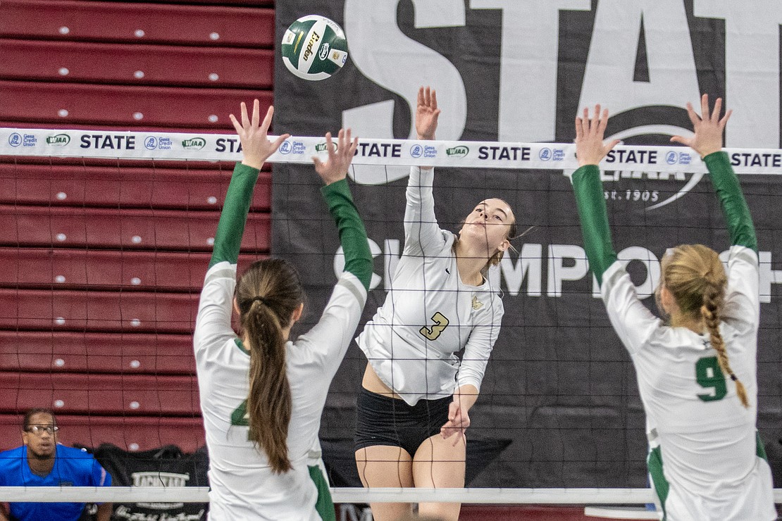 Meridian's Emry Claeys rises for a spike against Chelan Saturday, Nov. 11, in a 1A state semifinal match at the Yakima Valley SunDome.