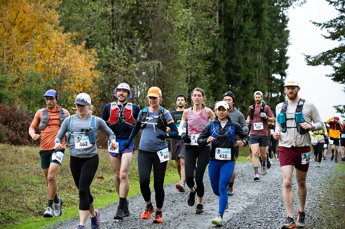 Long-course runners run along Pipeline Road on Galbraith Mountain.
