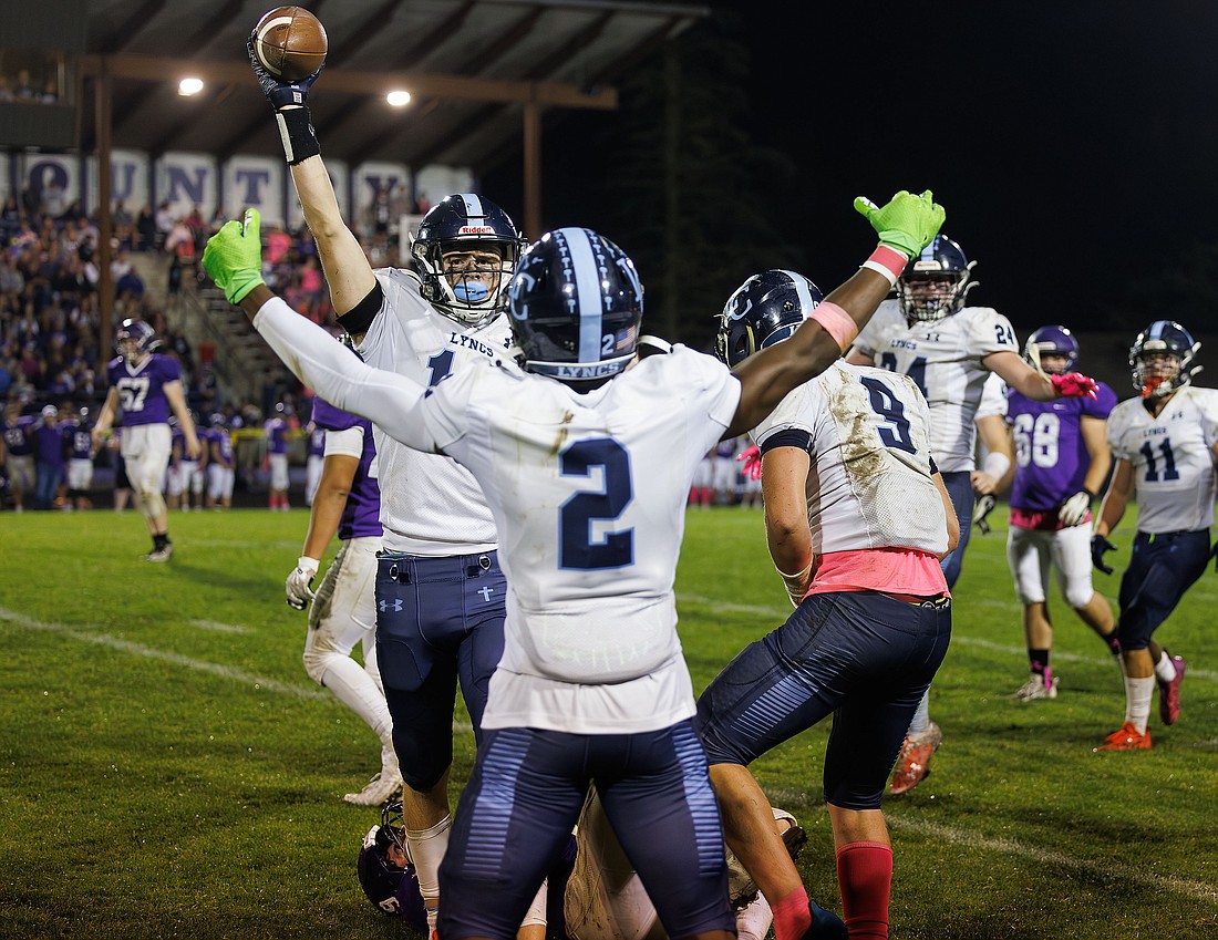 Lynden Christian's Tyson Bajema holds up the ball after recovering an onside kick Oct. 6 to help the Lyncs to a 21-20 win over Nooksack Valley. LC and NV will rematch in the 1A state semifinals on Friday, Nov. 17.