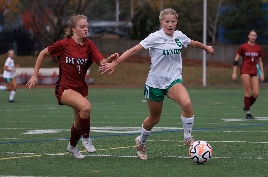 Lynden’s Rilanna Newcoomb takes the ball upfield Saturday, Nov. 4 during a district match against Cedarcrest.