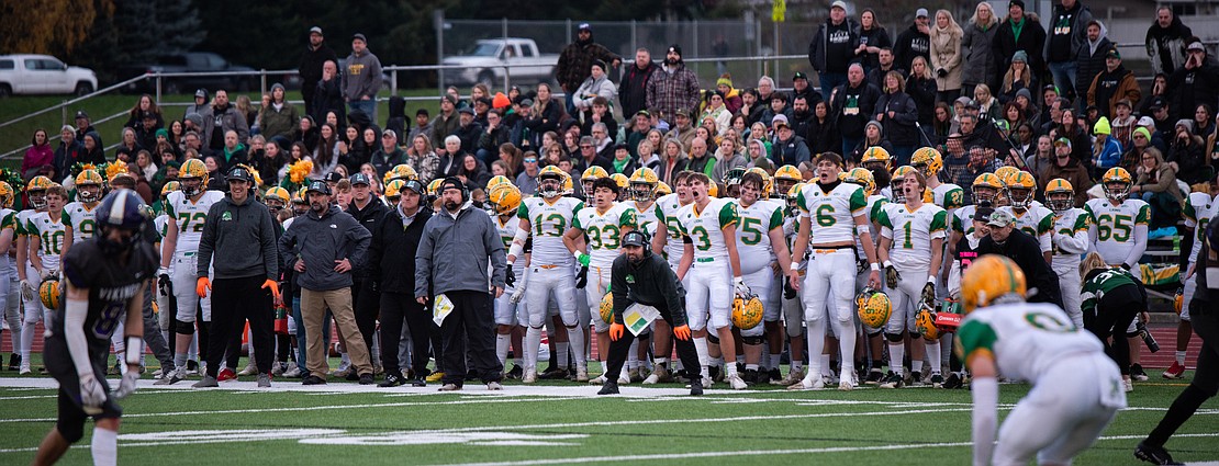 The Lynden sideline makes noise during a North Kitsap third down play.