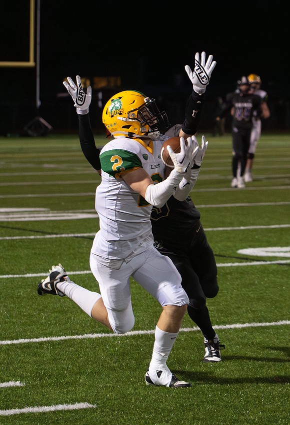 Lynden senior wide receiver Brady Elsner hauls in a pass down the sideline.