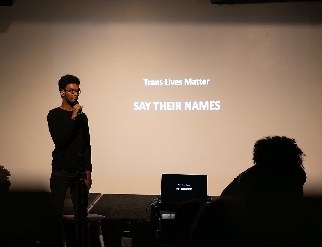 LGBTQ+ Western Director JoeHahn speaks at a Trans Day of Remembrance event Monday, Nov. 20 at the Underground Coffeehouse at Western Washington University. The event honored 62 people who died in the United States as a result of anti-transgender violence this year.
